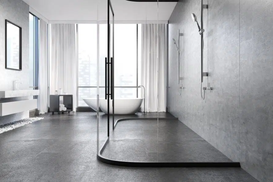 douche en beton ouverte et spacieuse avec baignoire style minimaliste blanc art beton specialiste en enduit beton au quebec